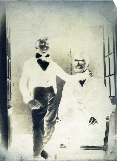 Father and son in doorway