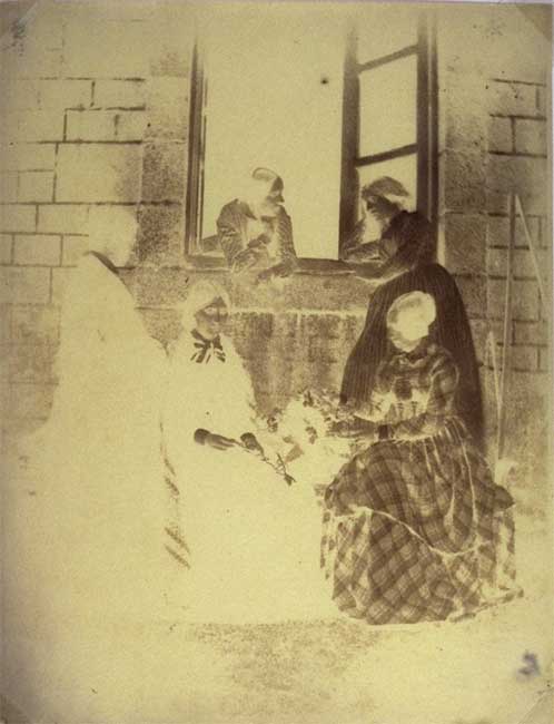 Five Women Visiting by a Window