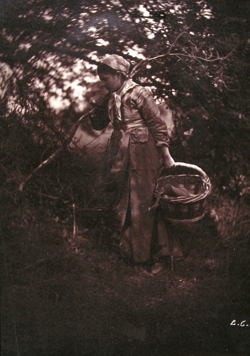 Woman Standing with Basket and Branch