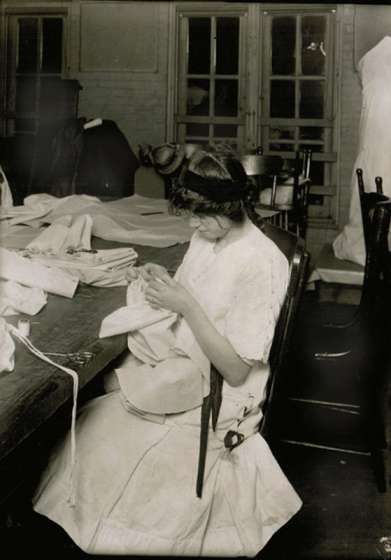 Female worker sewing in a workshop