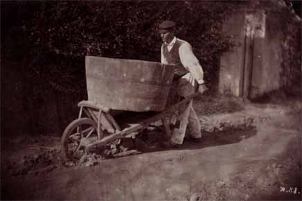 Man Pushing Cart