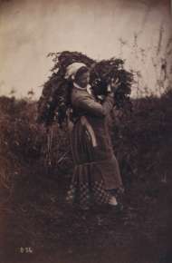 Woman with bundle over shoulder