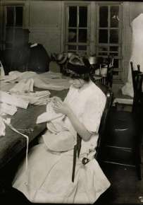 Female worker sewing in a workshop