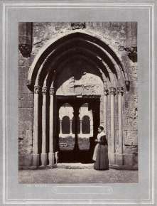 Arlesienne at the Entrance of the Cloisters of St. Trophime